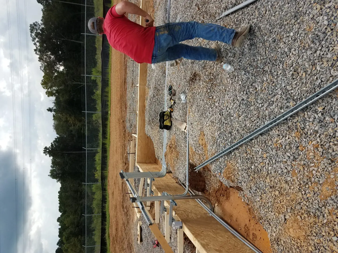 Electrician building a foundation for underground electrical systems